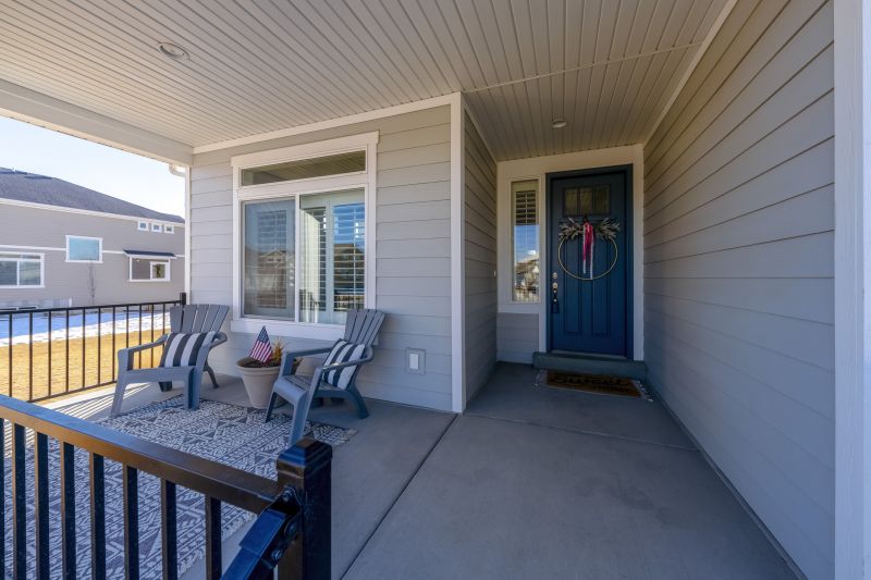 How A Freestanding Porch Installation Enhances Backyard Functionality